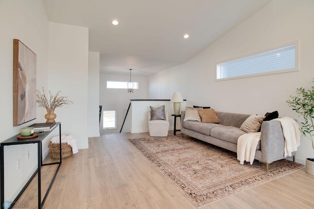3843 19th St S, Moorhead, MN 56560 - living room featuring wood finished floors, recessed lighting, a chandelier, baseboards, and vaulted ceiling