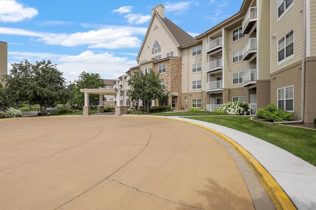 view of community featuring a lawn