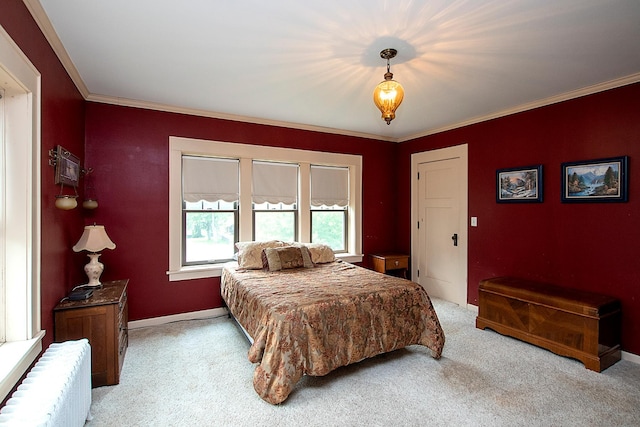 carpeted bedroom with ornamental molding and radiator heating unit