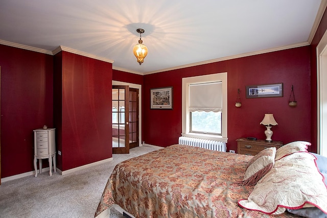 carpeted bedroom featuring radiator heating unit, french doors, and crown molding