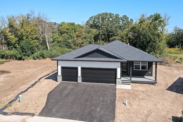 view of front of home with a garage