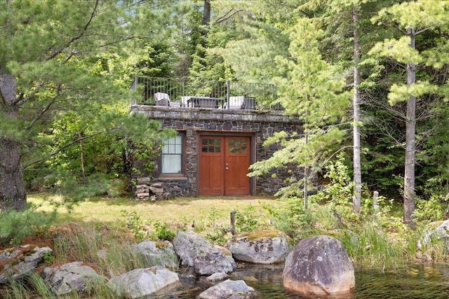 view of outbuilding featuring a water view