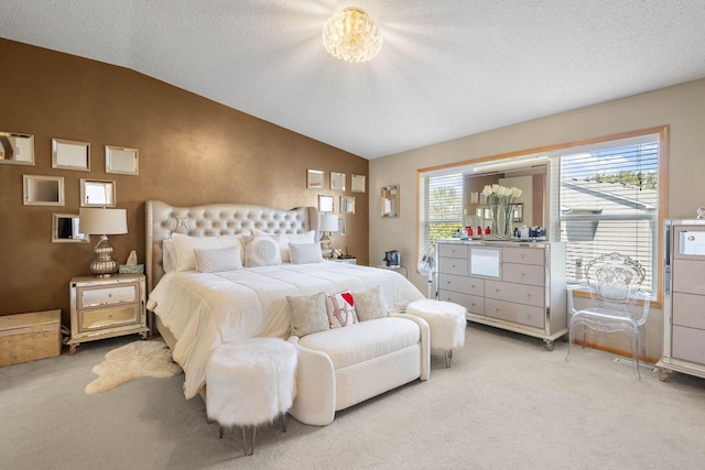 bedroom featuring a textured ceiling, lofted ceiling, light carpet, and multiple windows