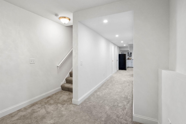 hallway with light carpet