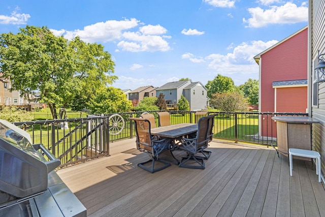 deck featuring a lawn