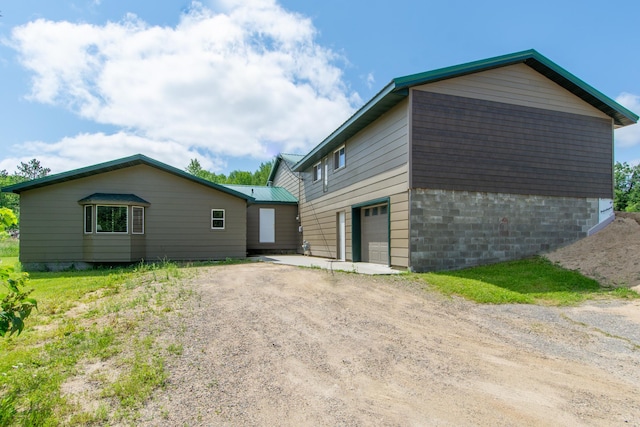 view of home's exterior with a garage