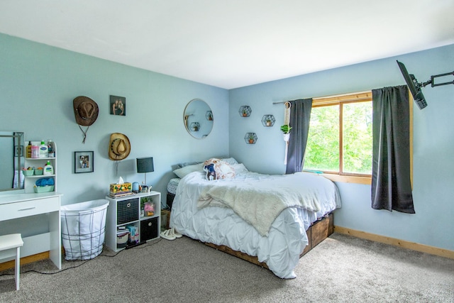 bedroom featuring carpet