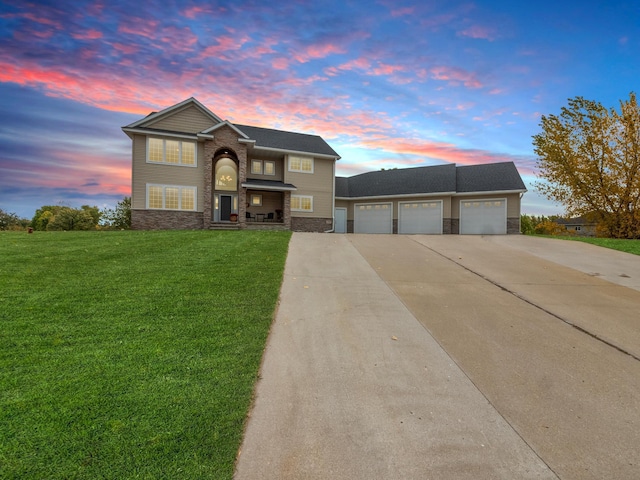 1599 Donway Ct NE, Alexandria, MN 56308 - traditional home with stone siding, concrete driveway, a yard, and an attached garage