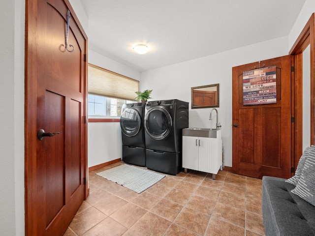 1599 Donway Ct NE, Alexandria, MN 56308 - washroom with washing machine and dryer and cabinet space