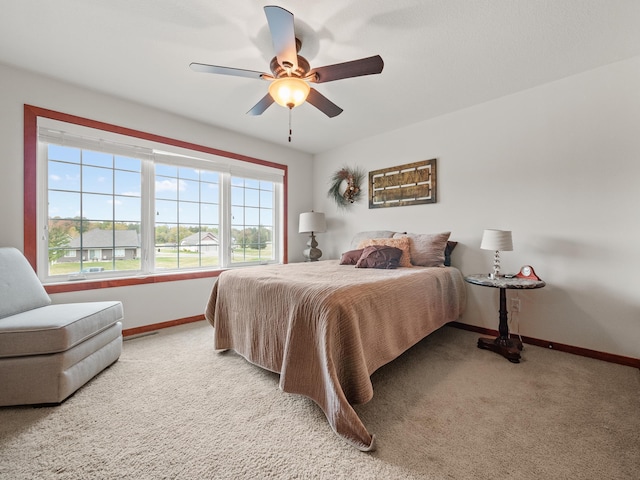 1599 Donway Ct NE, Alexandria, MN 56308 - bedroom featuring light carpet and a ceiling fan