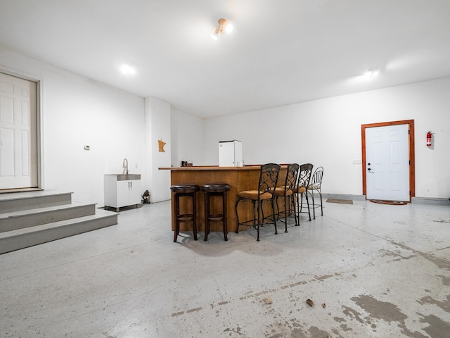 1599 Donway Ct NE, Alexandria, MN 56308 - indoor dry bar featuring concrete flooring