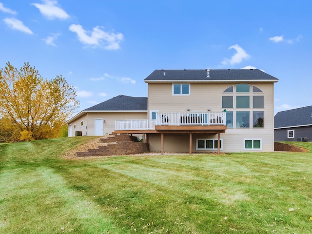 1599 Donway Ct NE, Alexandria, MN 56308 - rear view of property featuring a wooden deck and a lawn
