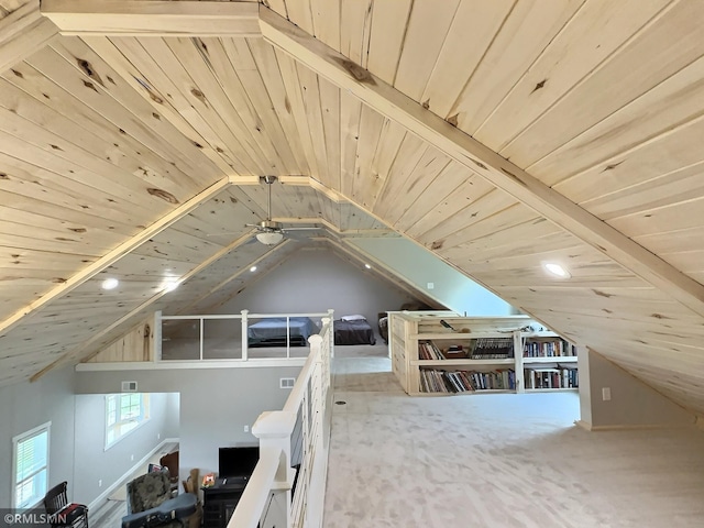 additional living space featuring wood ceiling, visible vents, and vaulted ceiling