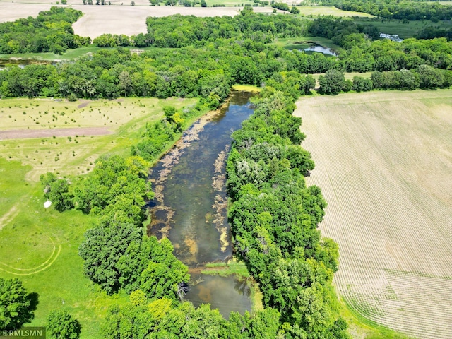 aerial view featuring a rural view and a water view