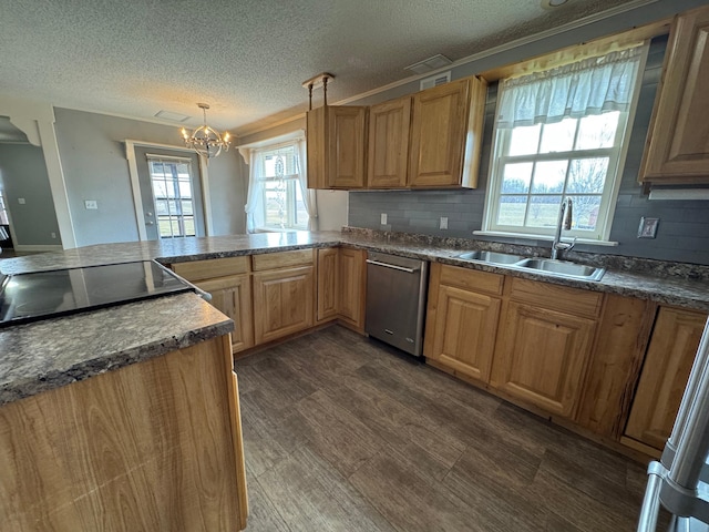 kitchen with a textured ceiling, tasteful backsplash, a sink, an inviting chandelier, and dishwasher