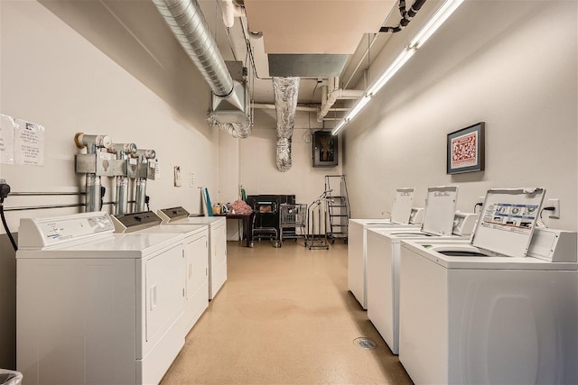 laundry room with separate washer and dryer