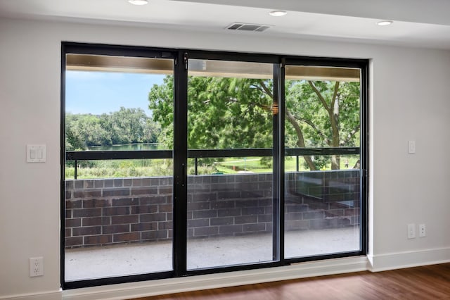 doorway featuring hardwood / wood-style flooring