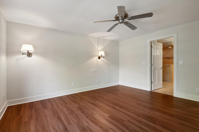 empty room featuring wood-type flooring and ceiling fan