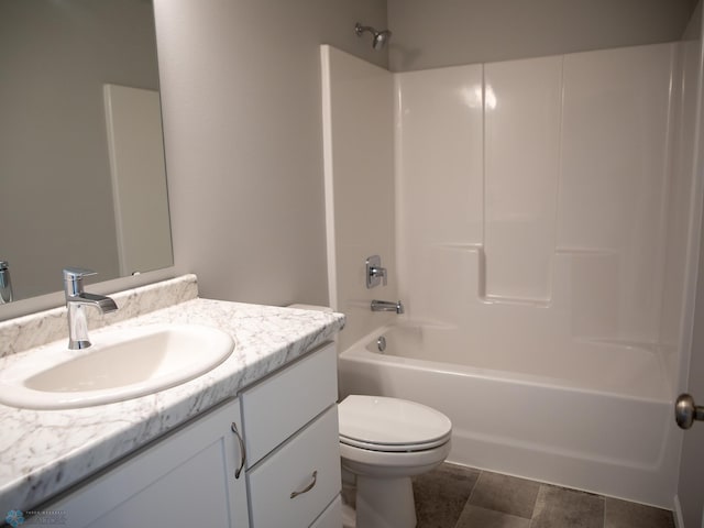 full bathroom with vanity, toilet, and bathtub / shower combination