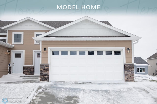 craftsman house with a garage