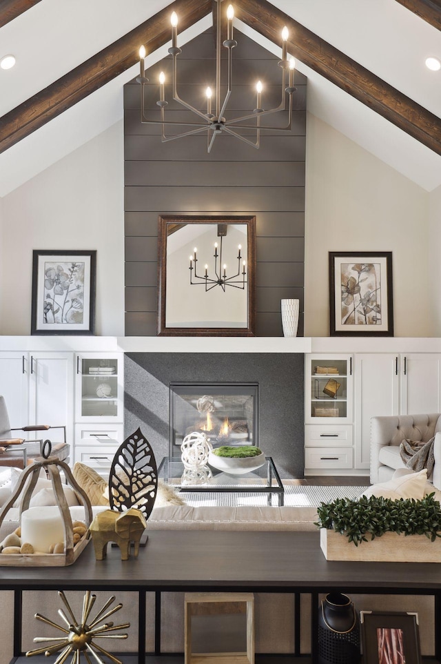 interior space featuring high vaulted ceiling and beamed ceiling