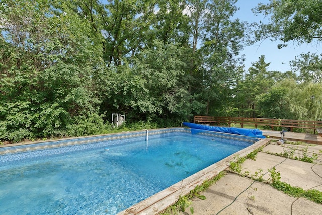 view of pool with a fenced in pool