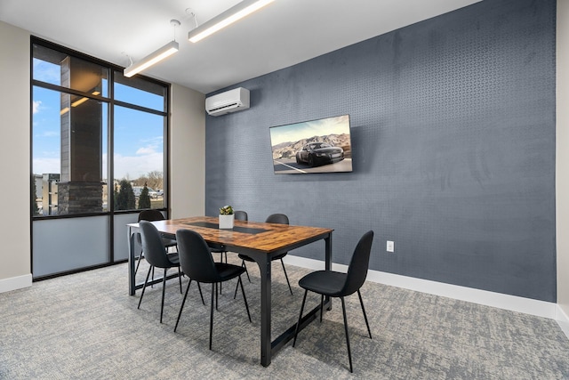 carpeted dining room with a wall unit AC