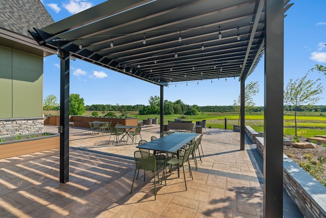 view of patio / terrace featuring a rural view