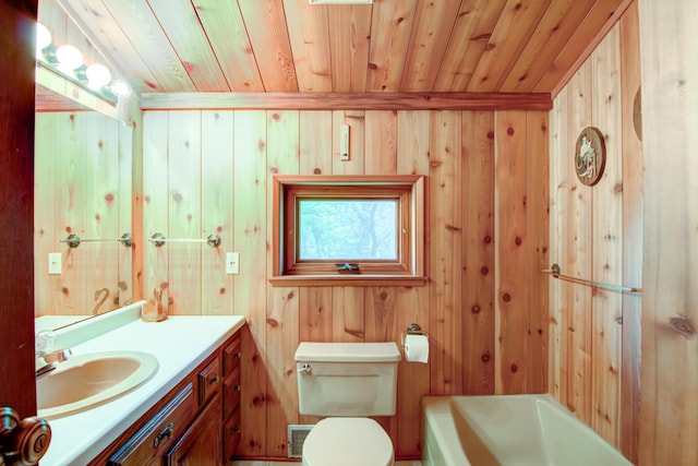 bathroom featuring vanity, a tub, wooden ceiling, and toilet