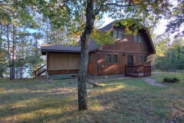 back of house with a yard