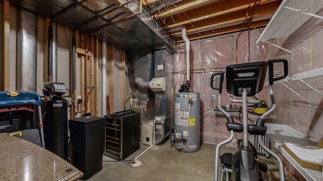 utility room with water heater and heating unit