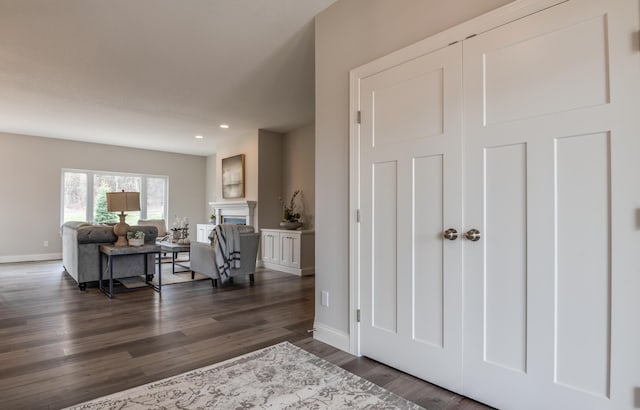 foyer entrance with dark hardwood / wood-style flooring