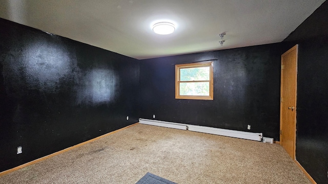 unfurnished room with carpet flooring and a baseboard radiator