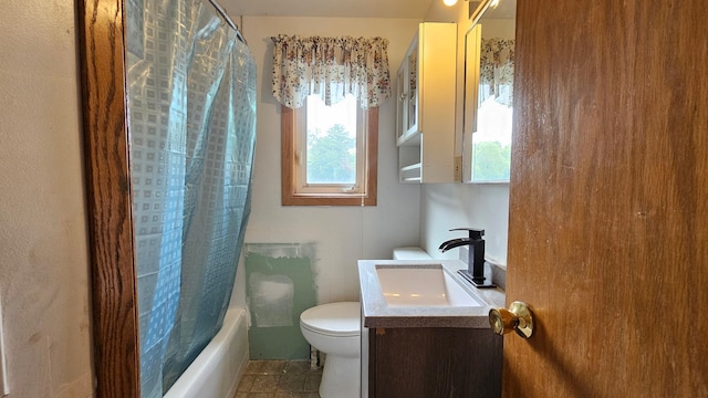 full bathroom with vanity, toilet, shower / tub combo, and tile patterned flooring