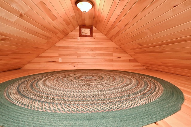 interior details featuring wood ceiling and wood walls