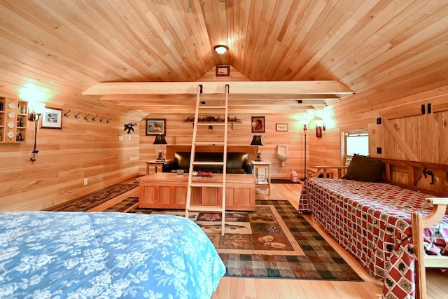 bedroom featuring wooden walls, wood ceiling, wood finished floors, and vaulted ceiling