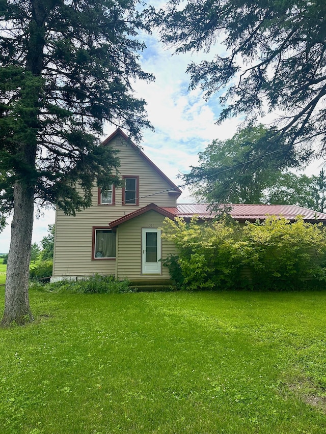 exterior space featuring a lawn