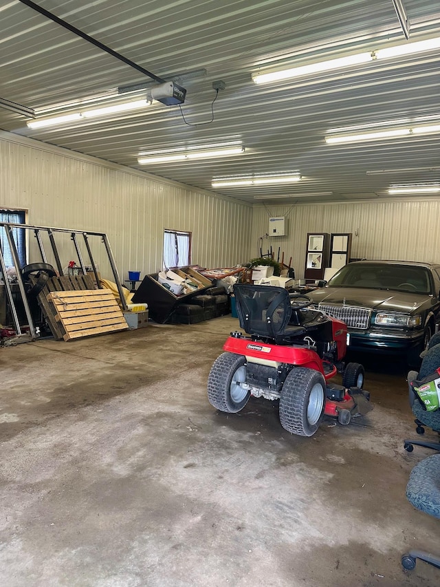 garage featuring a garage door opener