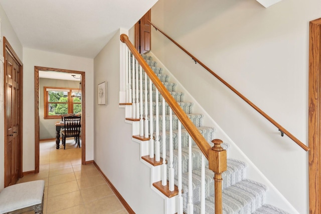 9642 Upton Rd, Minneapolis, MN 55431 - stairs with tile patterned floors and baseboards