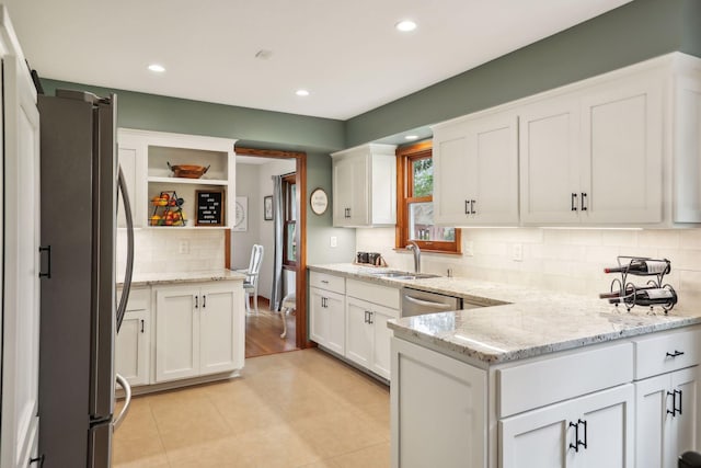 9642 Upton Rd, Minneapolis, MN 55431 - kitchen with stainless steel appliances, white cabinetry, tasteful backsplash, and recessed lighting
