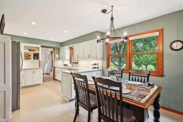 9642 Upton Rd, Minneapolis, MN 55431 - dining room featuring a chandelier, recessed lighting, and baseboards