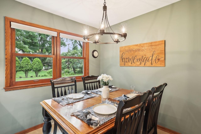 9642 Upton Rd, Minneapolis, MN 55431 - dining room with a chandelier, healthy amount of natural light, and baseboards