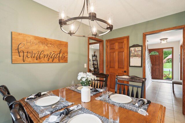 9642 Upton Rd, Minneapolis, MN 55431 - dining space featuring a chandelier and tile patterned floors
