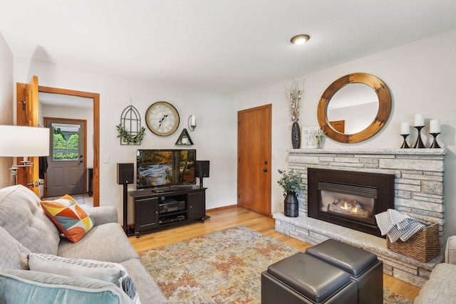 9642 Upton Rd, Minneapolis, MN 55431 - living room with wood finished floors and a stone fireplace