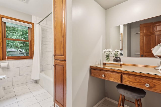 9642 Upton Rd, Minneapolis, MN 55431 - full bathroom featuring tile patterned floors, toilet, and shower / tub combo
