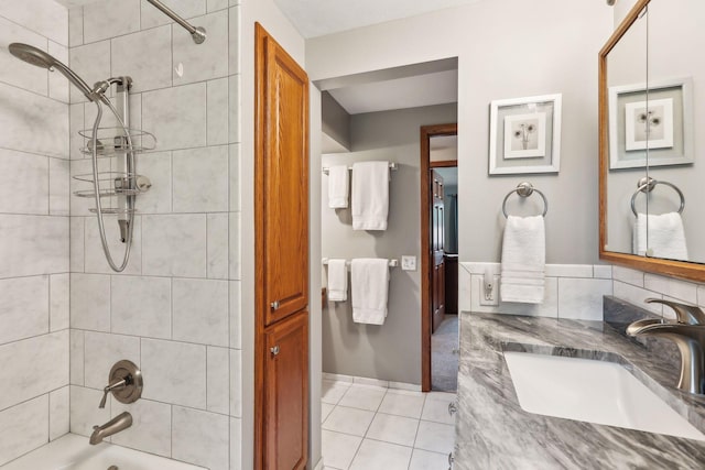 9642 Upton Rd, Minneapolis, MN 55431 - bathroom featuring washtub / shower combination, tile patterned floors, and vanity