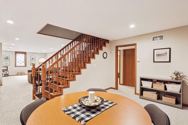 9642 Upton Rd, Minneapolis, MN 55431 - carpeted dining area with recessed lighting, stairway, and baseboards