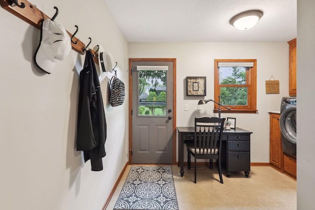 9642 Upton Rd, Minneapolis, MN 55431 - interior space with washer / dryer, light tile patterned flooring, and baseboards