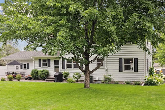9642 Upton Rd, Minneapolis, MN 55431 - rear view of property featuring a lawn