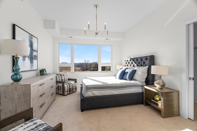 carpeted bedroom featuring a notable chandelier